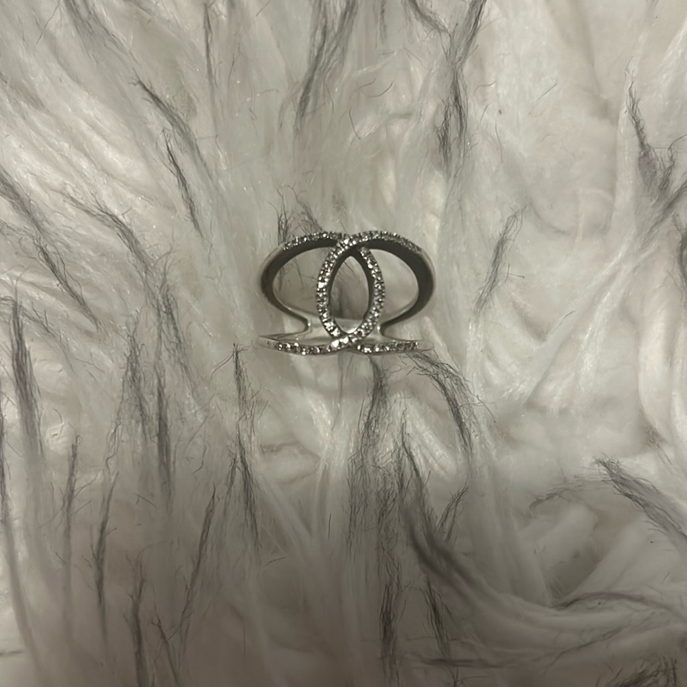 1/4 carat diamond ring in sterling silver.